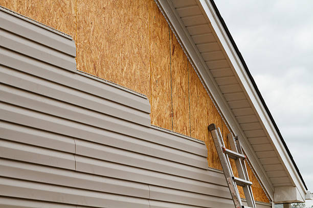 Professional Vinyl Siding technician working in Cochranville, PA